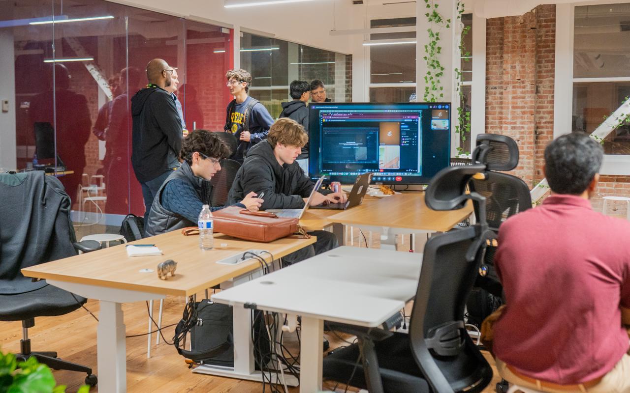 Members coding and collaborating at Homebrew Club